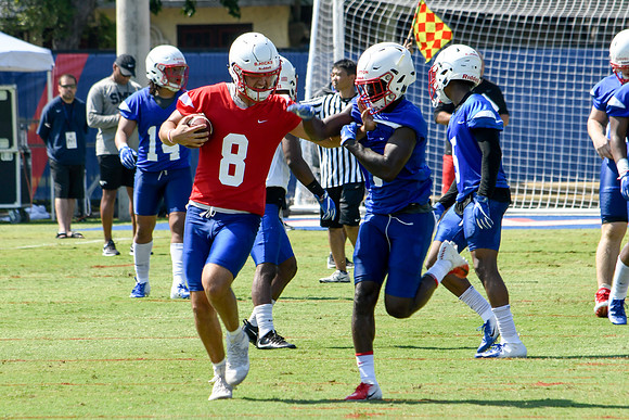 Ben Hicks Stiff-Arms a Defender